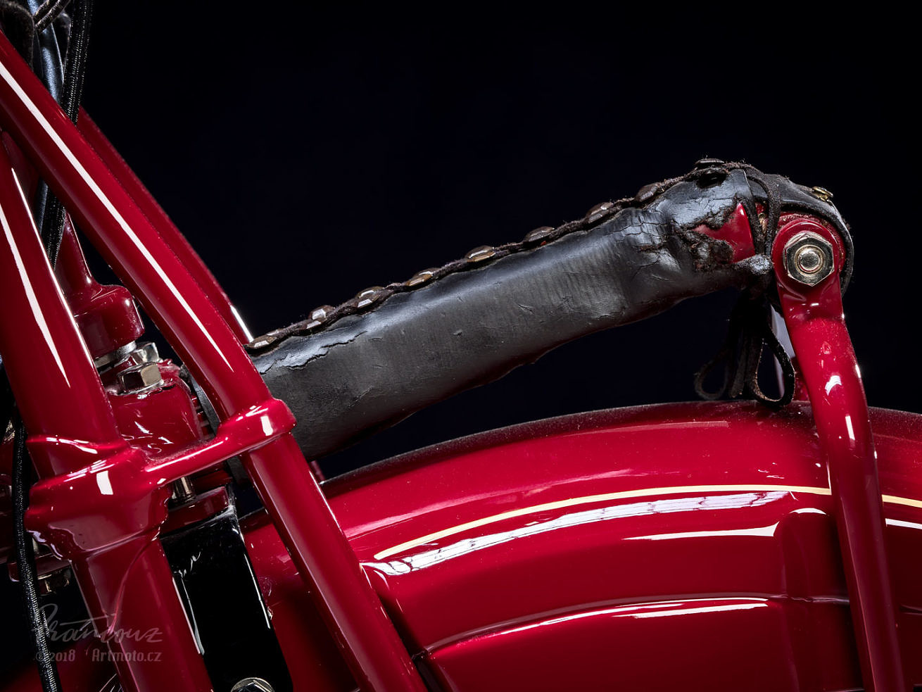 detail of Indian four 1930 leaf spring front end covered with leather cover