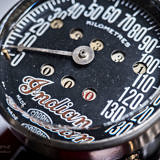 Deatils close up photo of tachometer of vintage Indian Four 1930